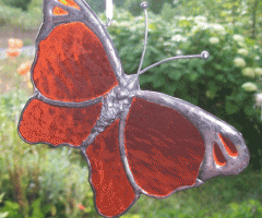 Orange butterfly stained glass suncatcher